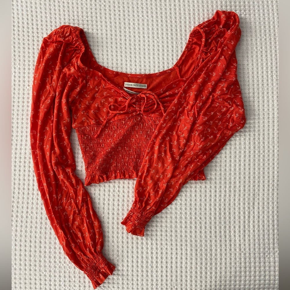 NWT Urban Outfitters red-orange, patterned, long-sleeved crop top
